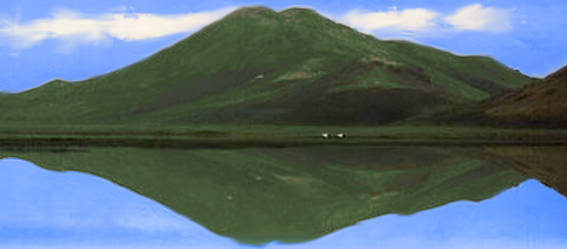 Picture of a hills reflecting in a small lake